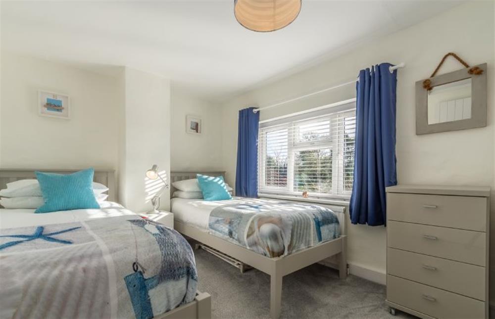 First floor: Bedroom two with twin beds at The Roost, Titchwell near Kings Lynn