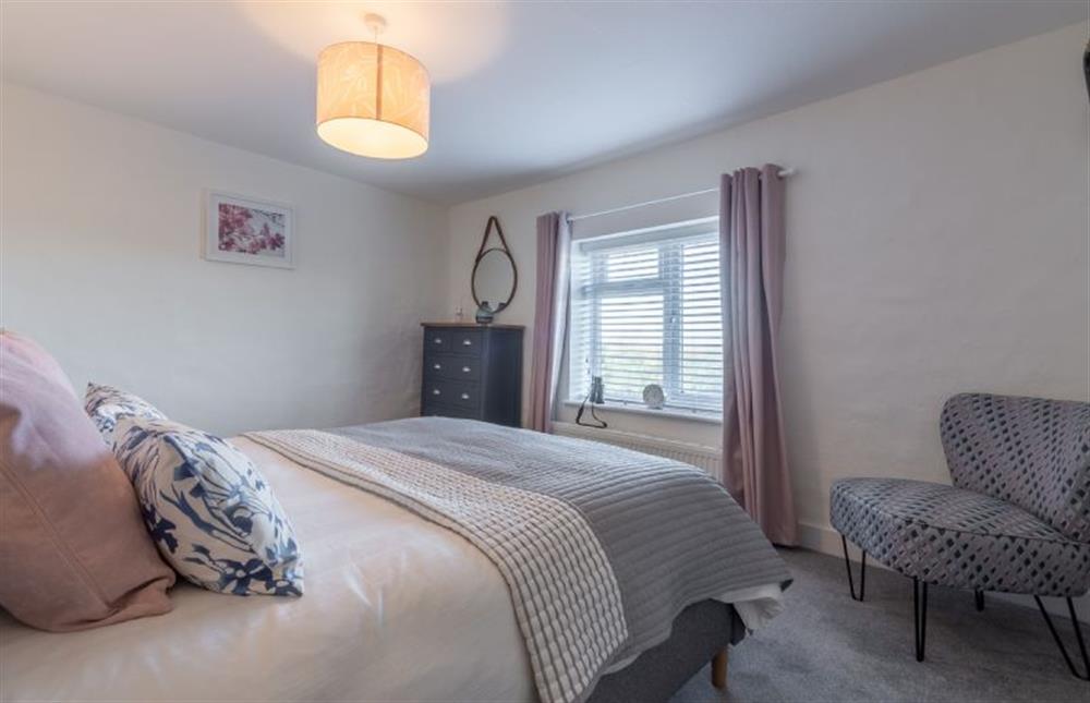 First floor: Master bedroom at The Roost, Titchwell near Kings Lynn