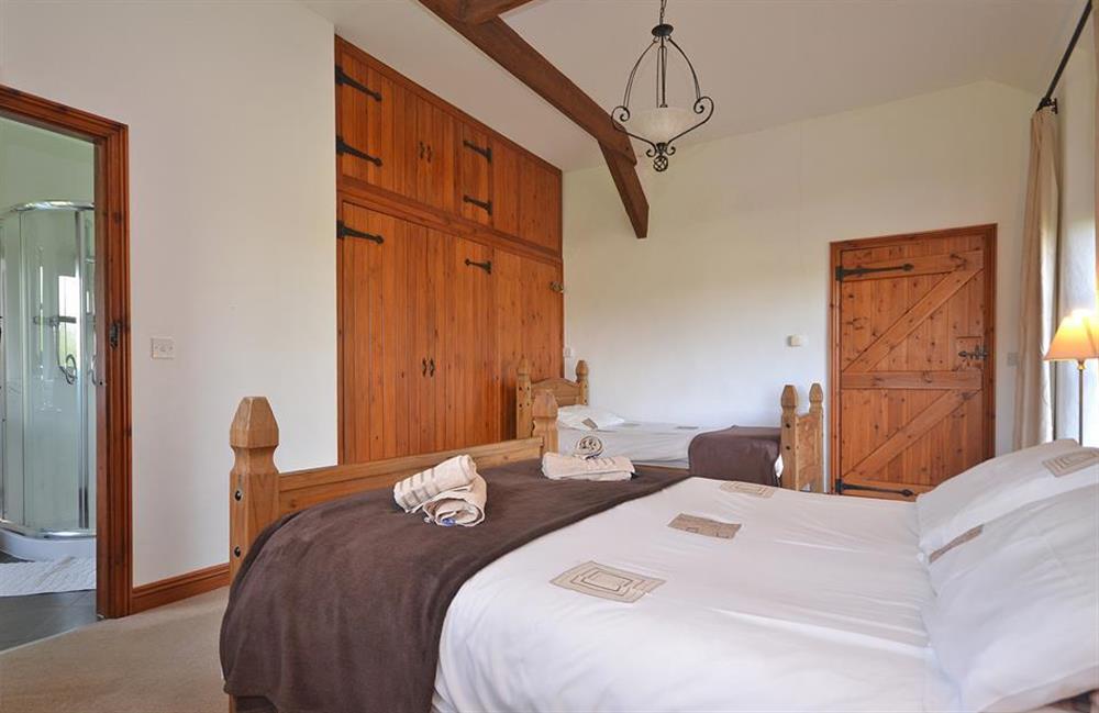 Another view of the ground floor family bedroom, showing the double and single beds at The Roost, Widemouth Bay