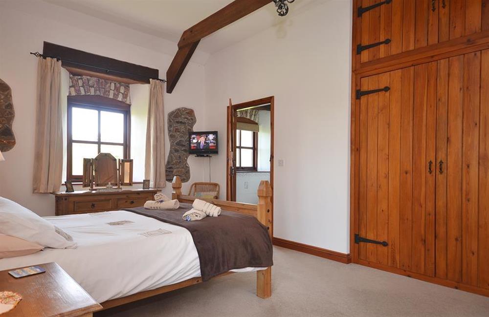 The light and airy ground floor family bedroom at The Roost, Widemouth Bay