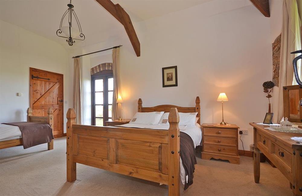 The spacious ground floor family bedroom at The Roost, Widemouth Bay