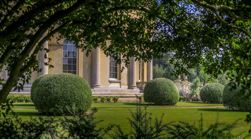 The Italianate garden, with lawns and manicured hedges, on the Ickworth Estate, Suffolk at The Round House in Bury St Edmunds, Suffolk