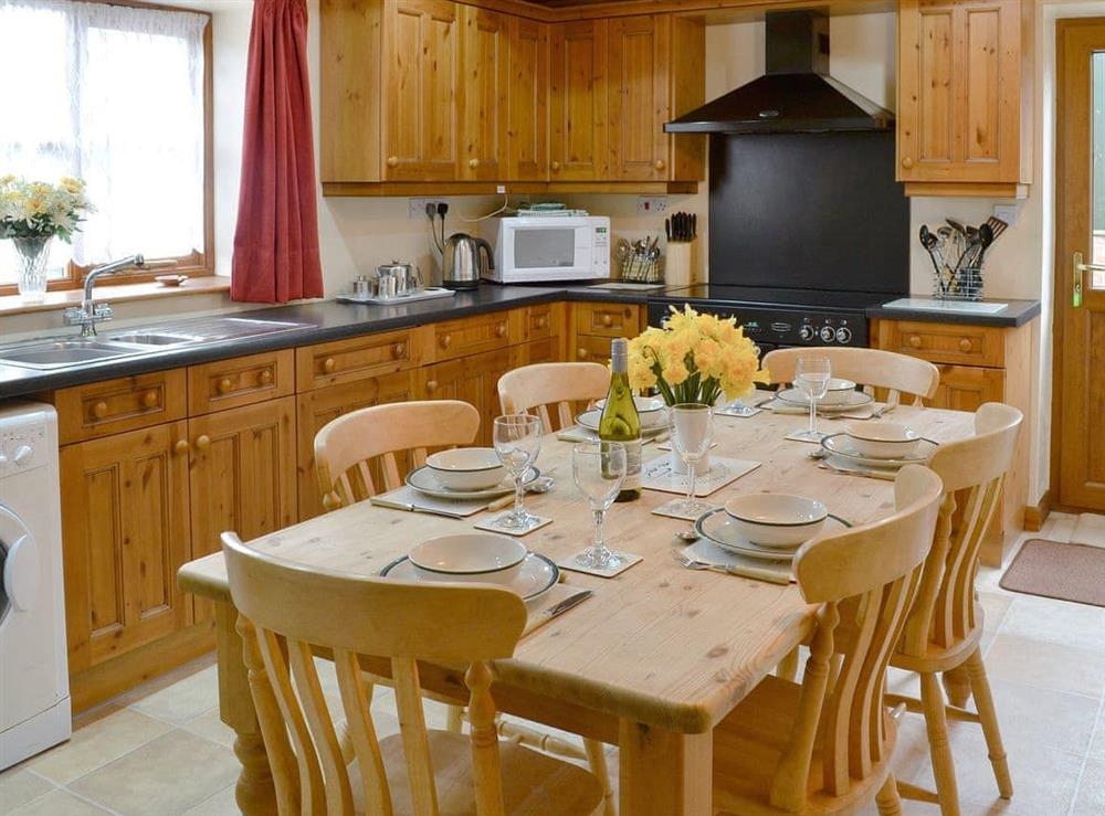Farmhouse style kitchen/diner at The Round House in Pyworthy, near Holsworthy, Devon