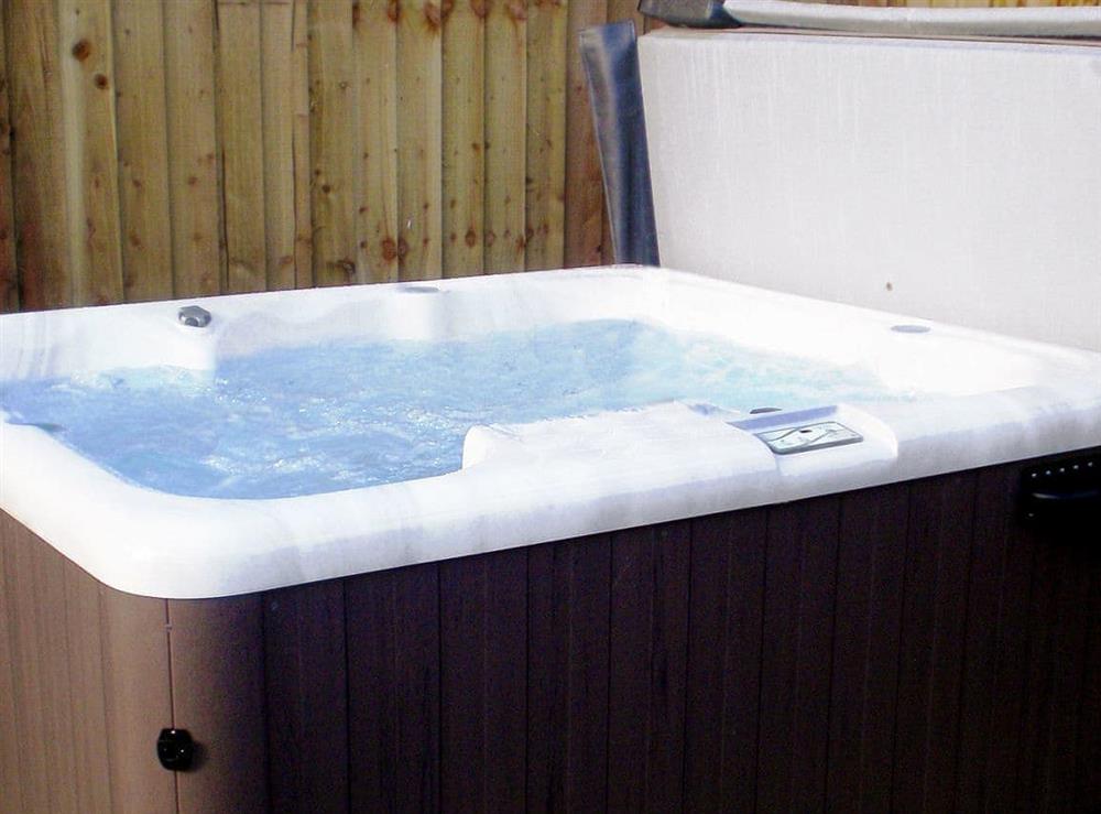 Relaxing hot tub at The Round House in Pyworthy, near Holsworthy, Devon