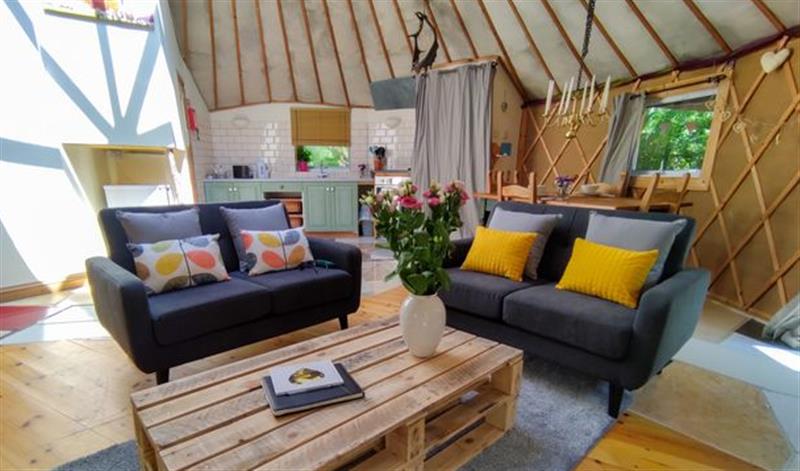 Relax in the living area at The Roundhouse, Mendip Hills