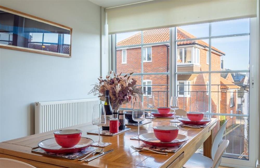 Dining area with views of the high street at The Sail Loft, Aldeburgh