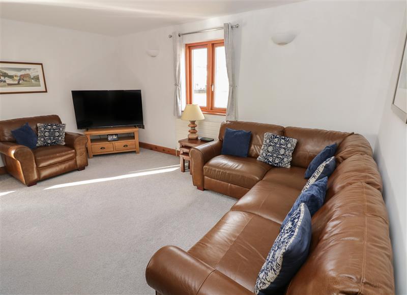 Relax in the living area at The Sail Loft, Milford Haven