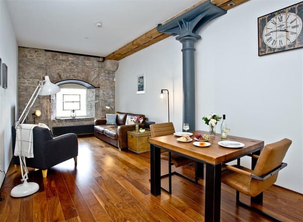 Open plan living space at The Sail Loft in Royal William Yard, Plymouth
