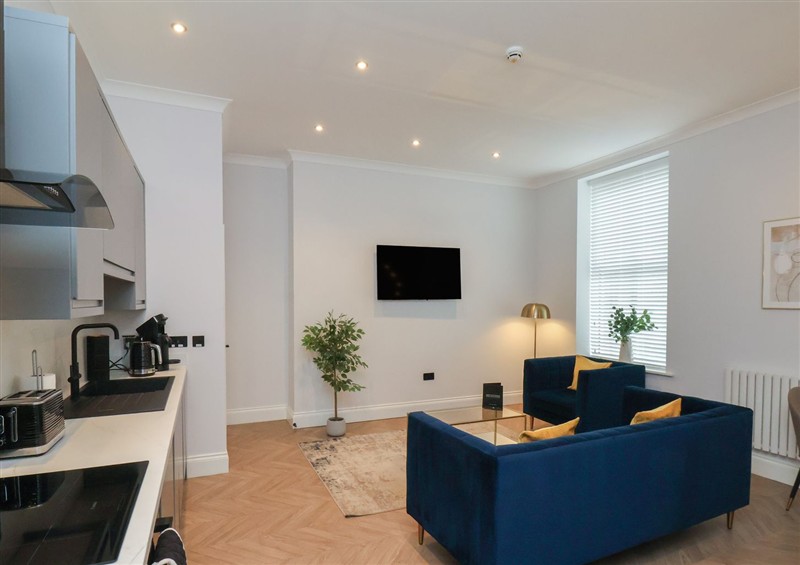 Enjoy the living room at The Salisbury Apartment 203, Scarborough