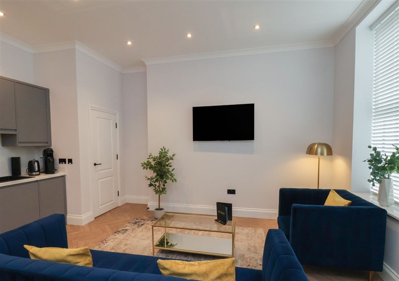 Relax in the living area at The Salisbury Apartment 203, Scarborough