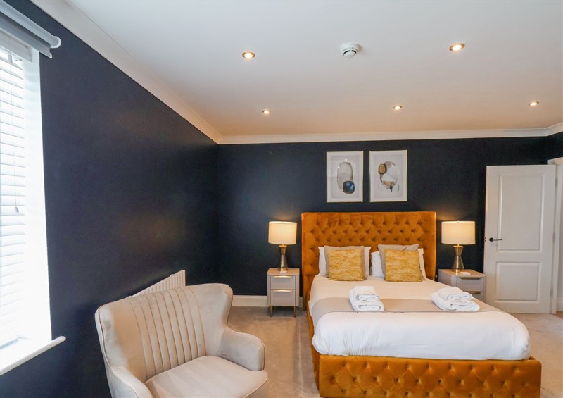 This is a bedroom at The Salisbury Apartment 404, Scarborough