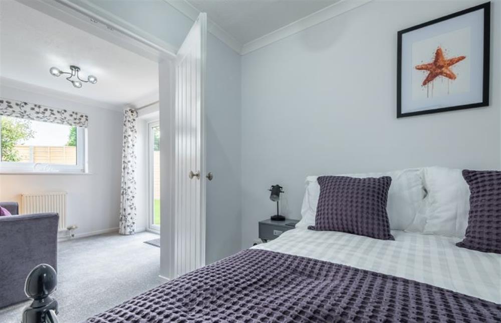 Ground floor: Bedroom two leads to the sun room at The Saltings, Heacham near Kings Lynn