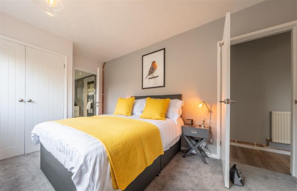 Ground floor: Master bedroom with en-suite shower room at The Saltings, Heacham near Kings Lynn