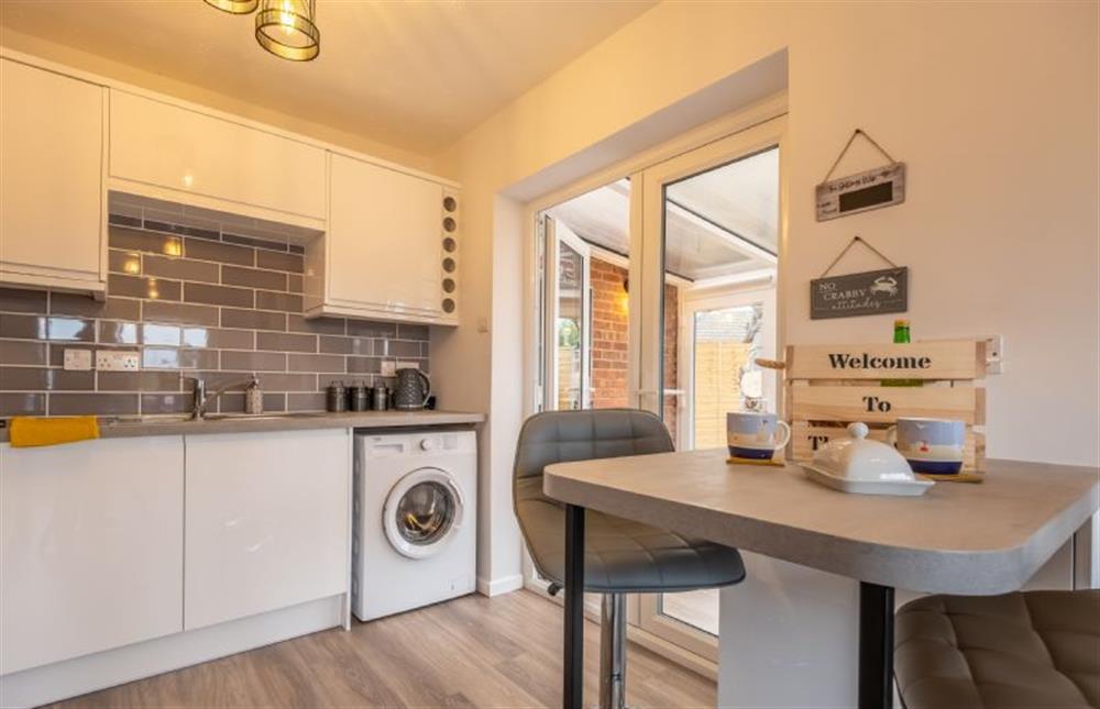 Ground floor: The kitchen leads to the conservatory at The Saltings, Heacham near Kings Lynn