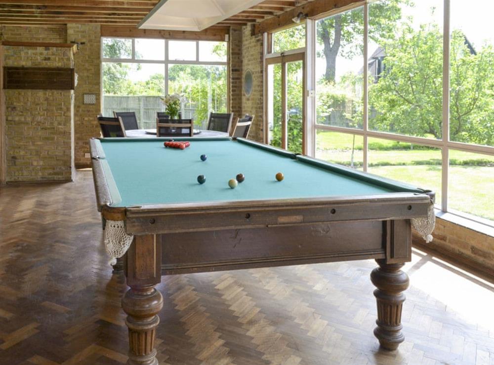 Full-size snooker table within summerhouse