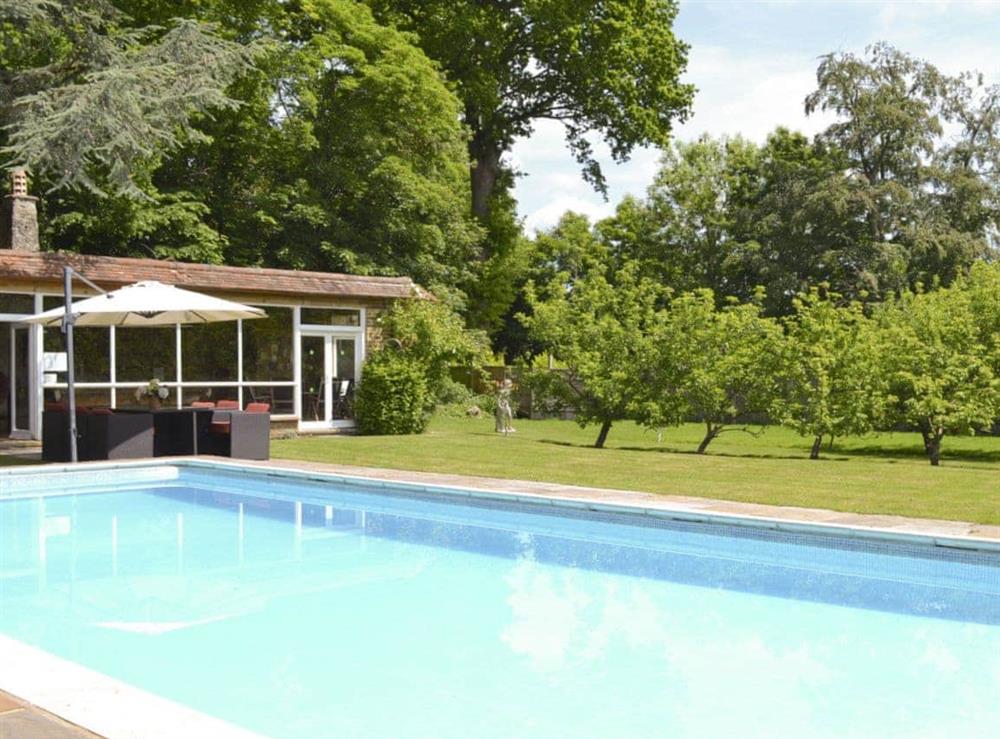 Heated outdoor swimming pool at The Sanctuary in Little Chart, near Ashford, Kent