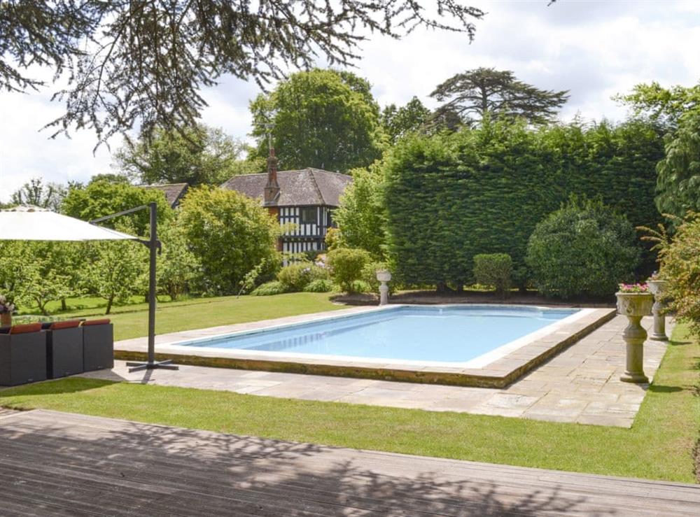 Luxurious outdoor heated swimming pool at The Sanctuary in Little Chart, near Ashford, Kent