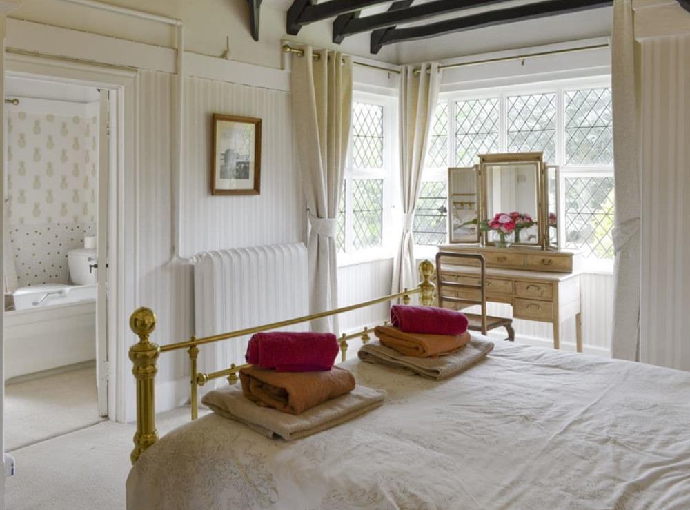 Restful master bedroom at The Sanctuary in Little Chart, near Ashford, Kent