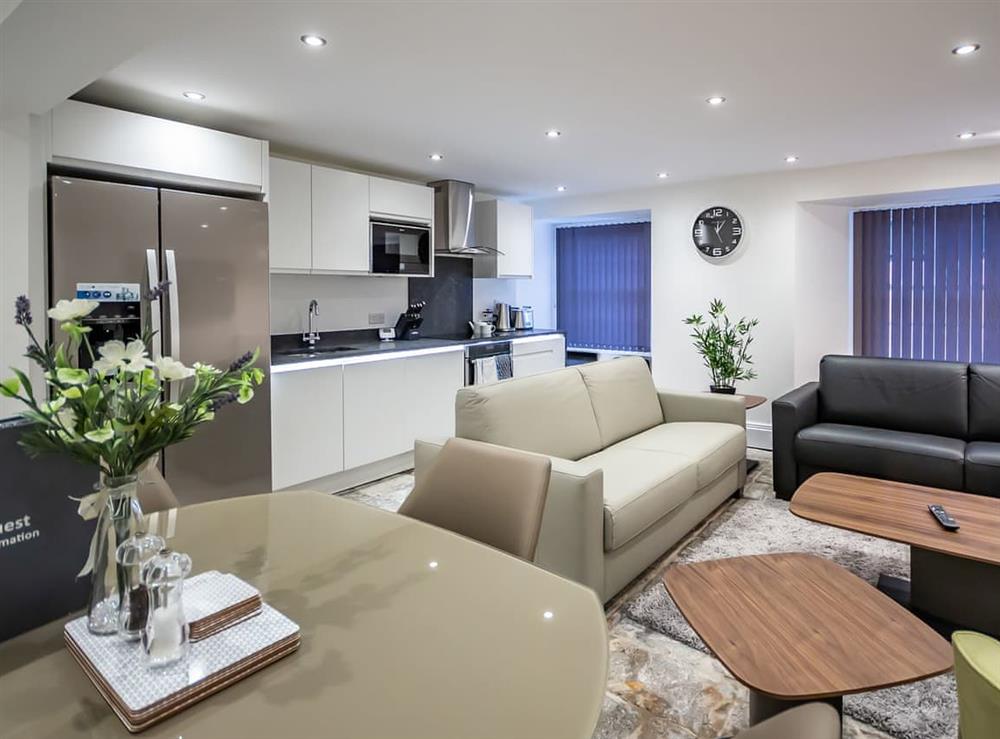 Open plan living space at The Sandringham Suite in Plymouth, Devon