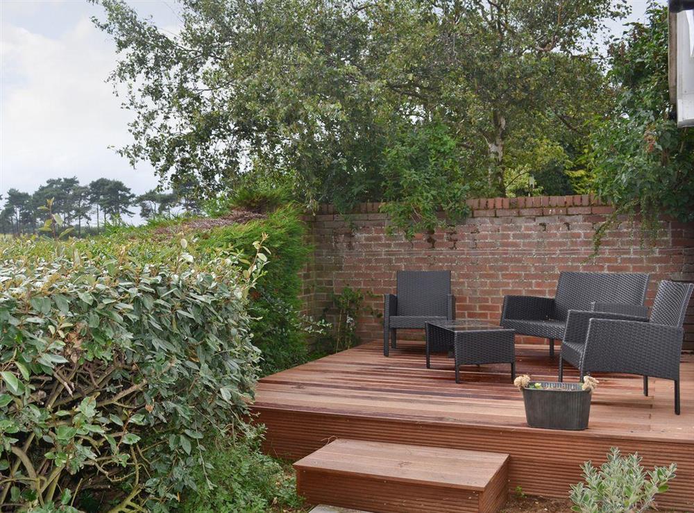 Attractive terraced decking with comfortable outdoor seating