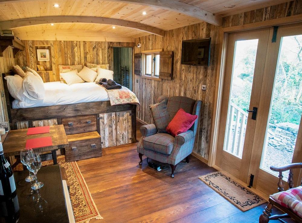 Spacious open plan living space (photo 2) at The Shepherds Hut at Gowan Bank Farm in Ings, near Windermere, Cumbria