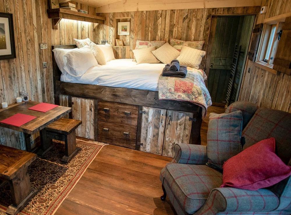 Spacious open plan living space (photo 3) at The Shepherds Hut at Gowan Bank Farm in Ings, near Windermere, Cumbria