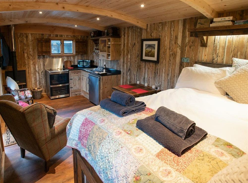 Spacious open plan living space at The Shepherds Hut at Gowan Bank Farm in Ings, near Windermere, Cumbria