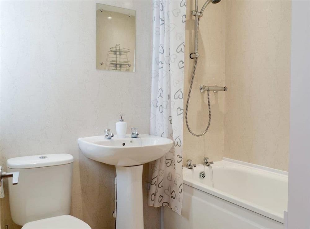 Family bathroom with shower over bath at The Shieling in Keswick, Cumbria