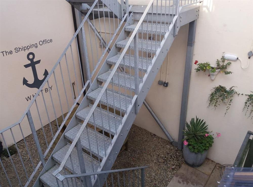 External staircase to the courtyard seating area at The Shipping Office in Whitby, Yorkshire, North Yorkshire