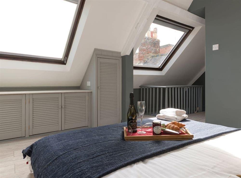 Fantastic master bedroom with Velux windows at The Shipping Office in Whitby, Yorkshire, North Yorkshire
