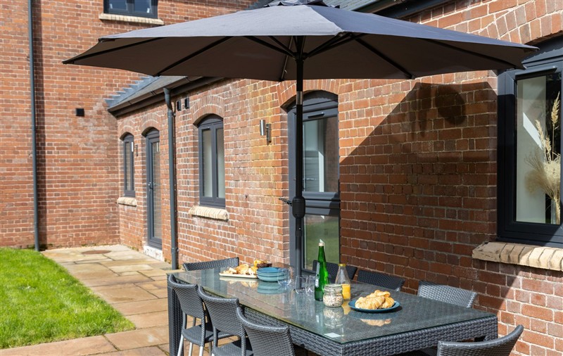 Enjoy a cup of tea on the patio at The Shippon, Devon