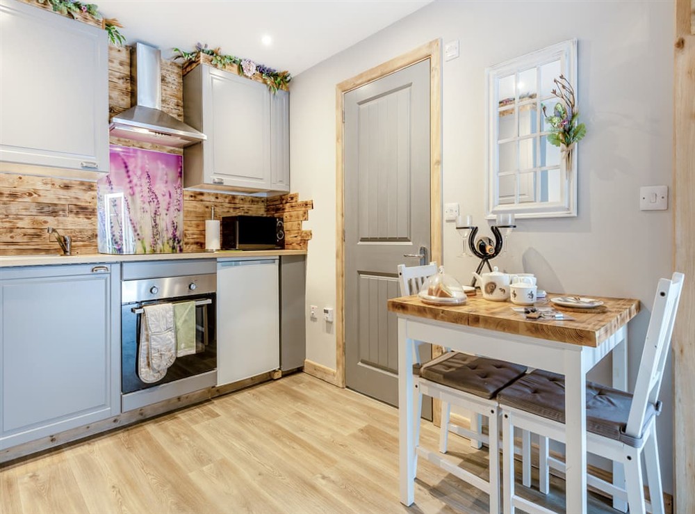 Open plan living space (photo 5) at The Shire Cottage in Ringwood, New Forest, Hampshire