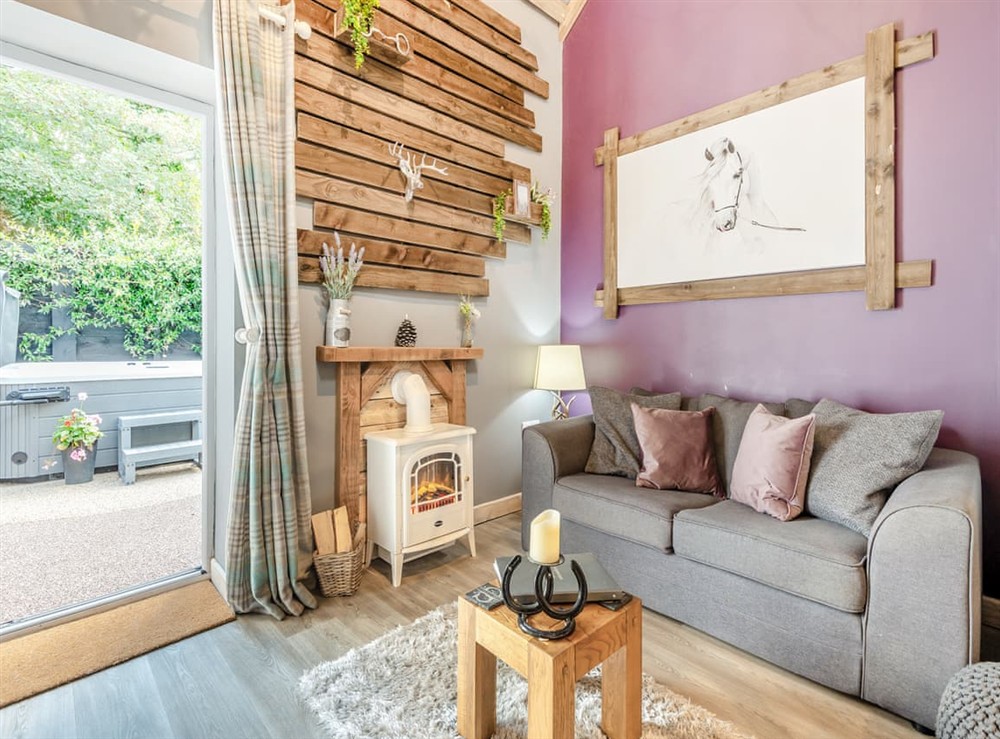 Open plan living space at The Shire Cottage in Ringwood, New Forest, Hampshire
