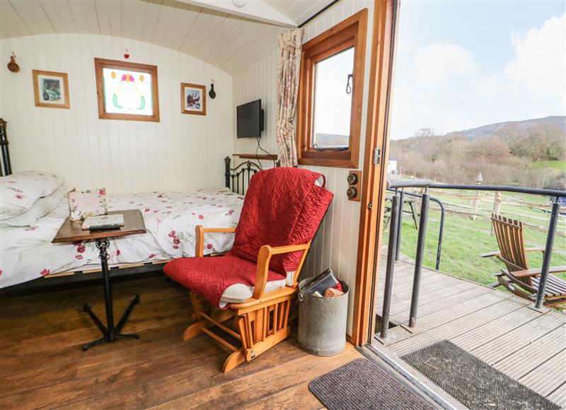 Relax in the living area at The Shire Hut, Waen near St Asaph