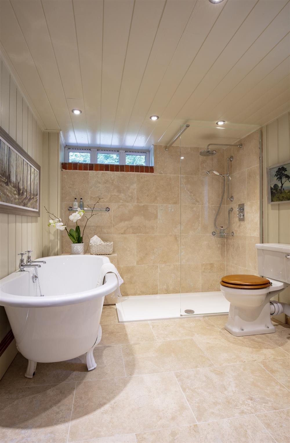 Bedroom one; The Stalkers room’s en-suite bathroom with shower at The Shooting Lodge, Dorset