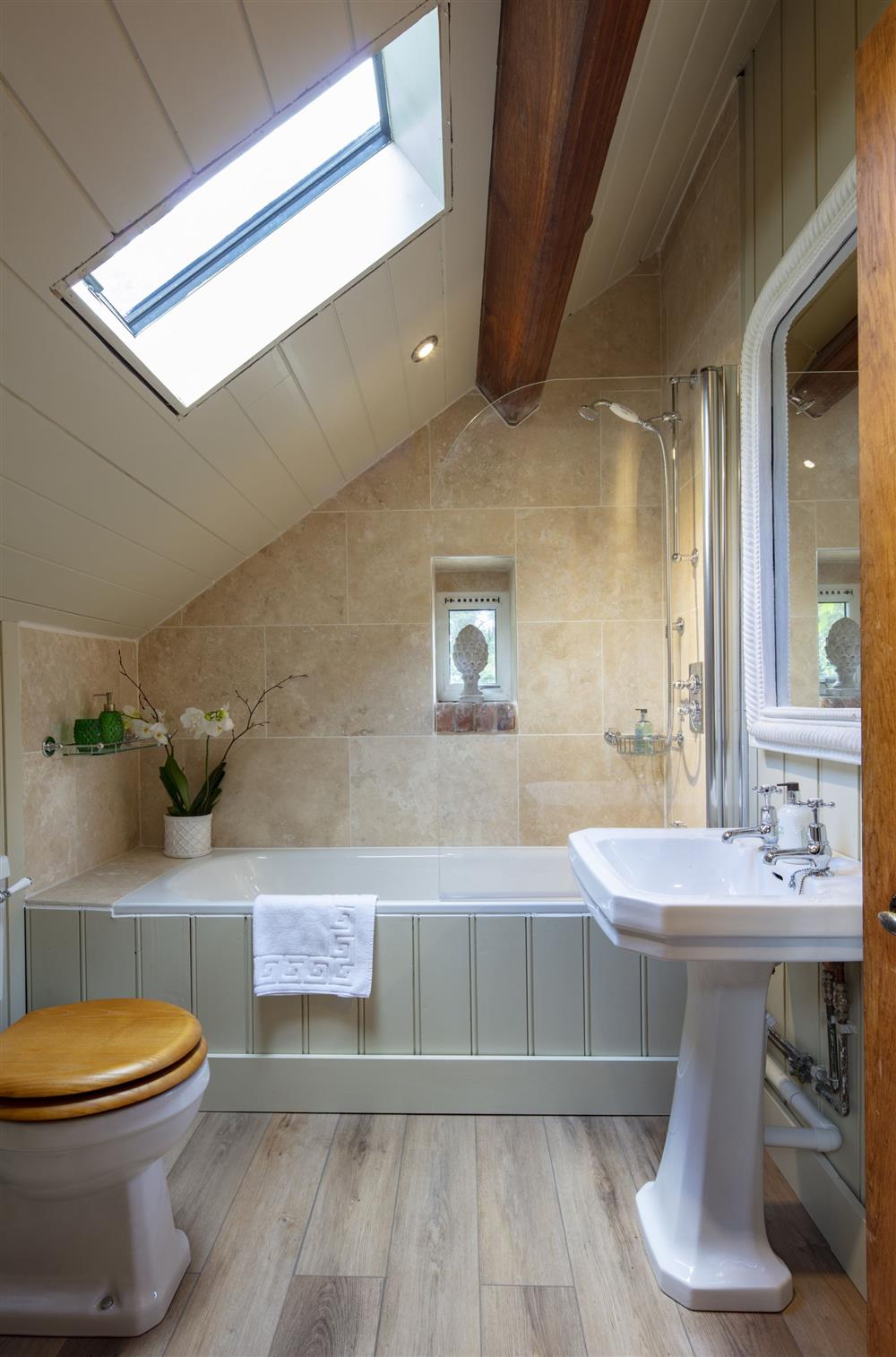 Bedroom three; The Rose Room’s private bathroom with shower at The Shooting Lodge, Dorset