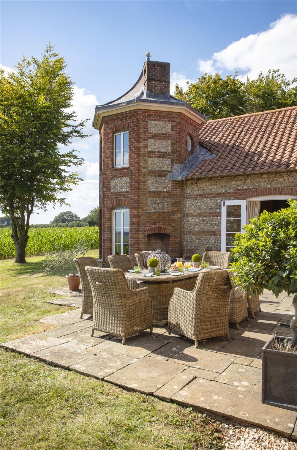 The dining terrace with outstanding rural views at The Shooting Lodge, Dorset