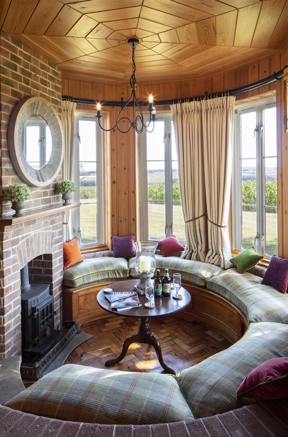 The unique Turret with its cosy seating at The Shooting Lodge, Dorset