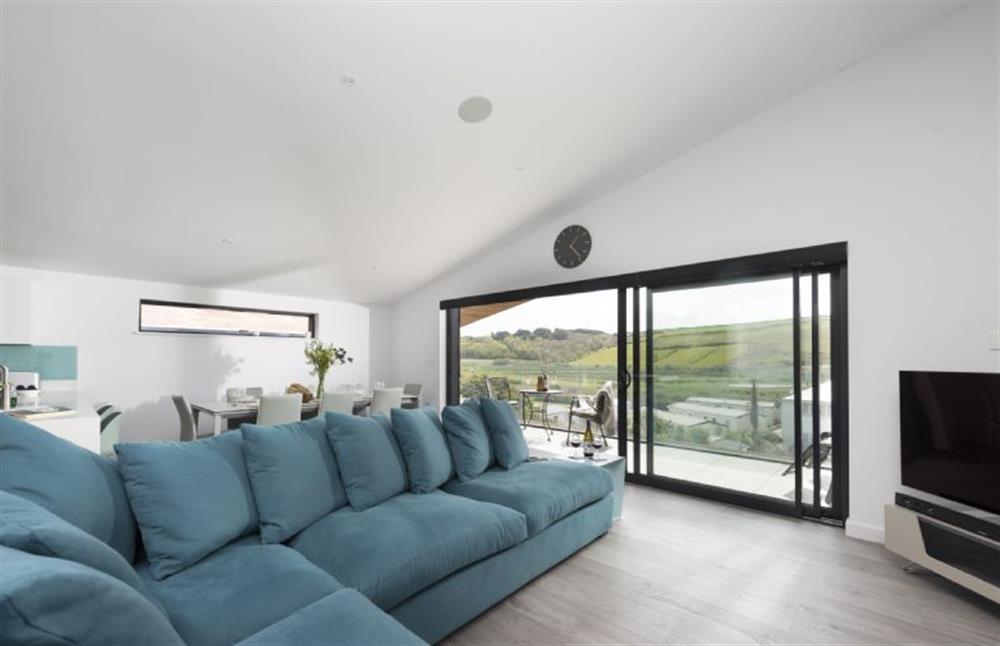 Sitting area situated on the first floor looking out towards the balcony at The Shore, Mawgan Porth