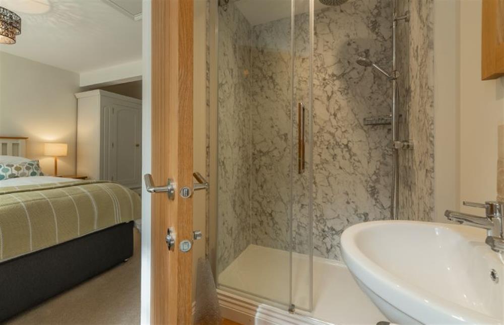 First floor: Bedroom two, en-suite shower room at The Sidings, Docking near Kings Lynn