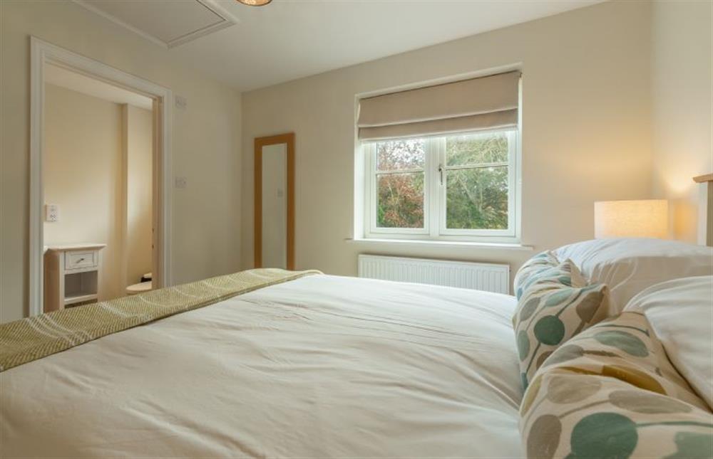 First floor: Bedroom two has en-suite shower room at The Sidings, Docking near Kings Lynn