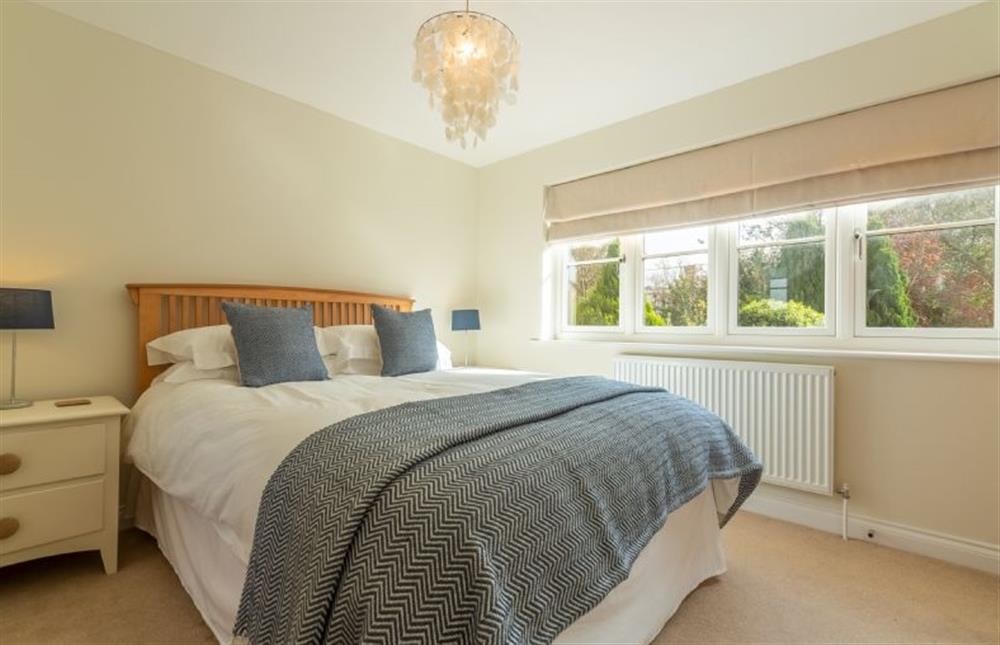 First floor: The master bedroom has king-size bed at The Sidings, Docking near Kings Lynn