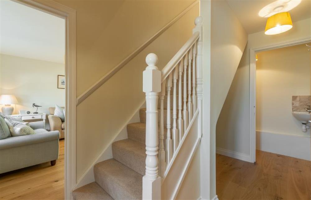 Ground floor: Hallway with cloakroom, stairs and sitting room at The Sidings, Docking near Kings Lynn