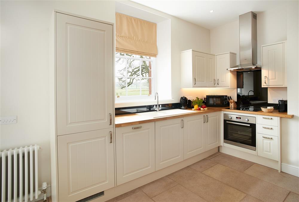 Well-equipped kitchen at The Sir Walter Scott Apartment, Netherby Hall, Longtown