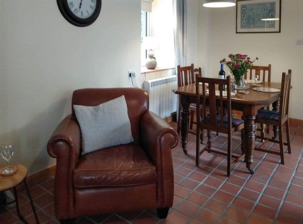 Living room/dining room at The Smiddy in Glasserton, near Whithorn, Wigtownshire