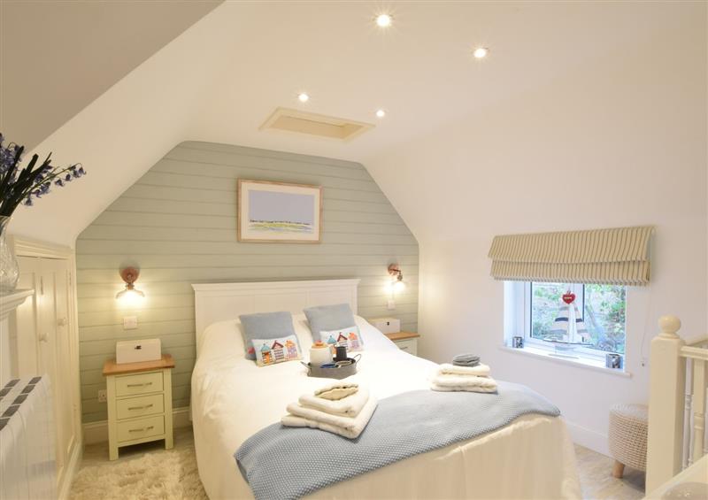 This is a bedroom at The Smokehouse Cottage, Southwold