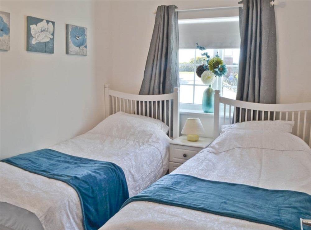 Twin bedroom at The Snug in Caergeiliog, near Holyhead, Gwynedd