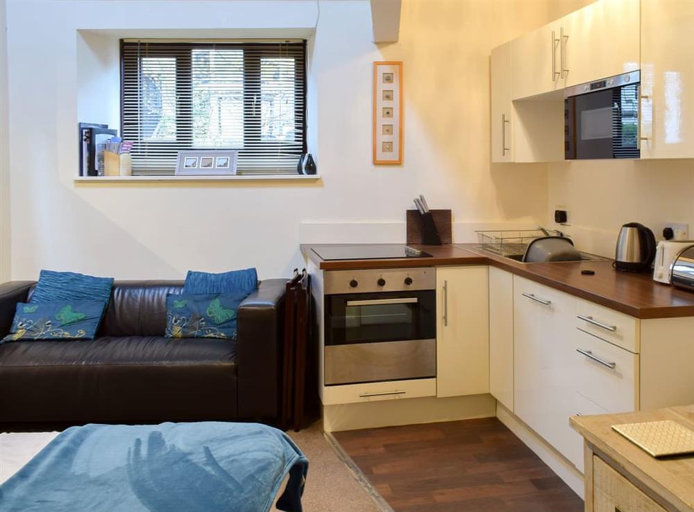Cosy and romantic open plan living space at The Stable Nest in Bowness on Windermere, Cumbria