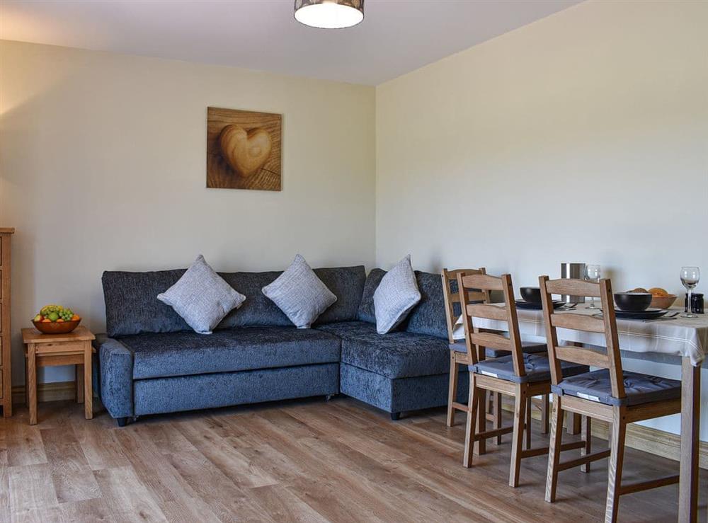Living room with dining area at The Stables at Green View in Winsham, near Chard, Dorset