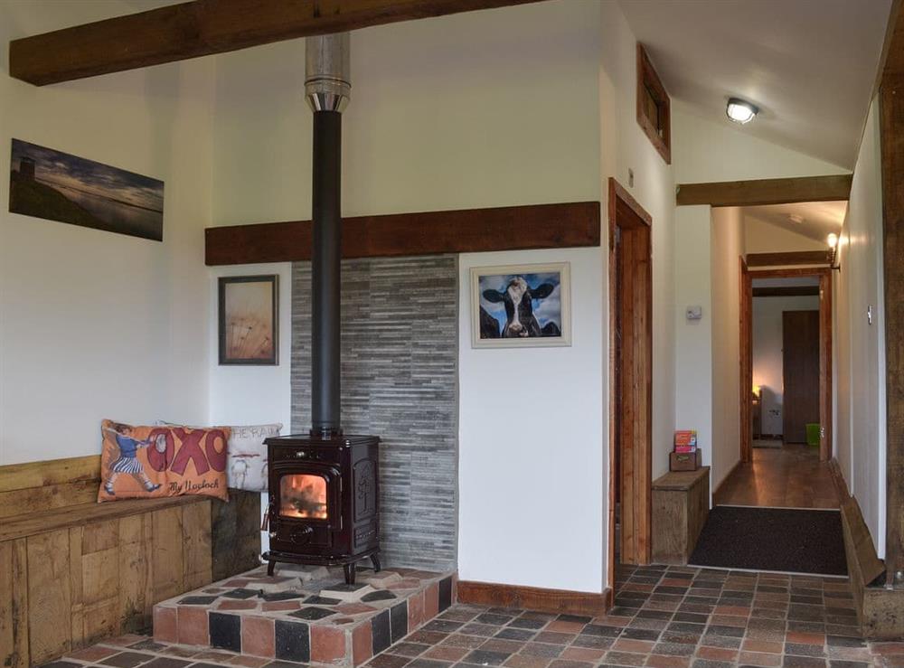 Open plan living space with wood burner at The Stables at the Oaks in Yoxall, near Burton-on-Trent, Staffordshire